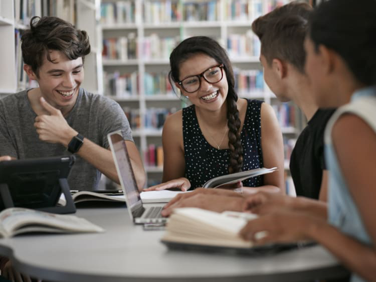 Student assistant helping students